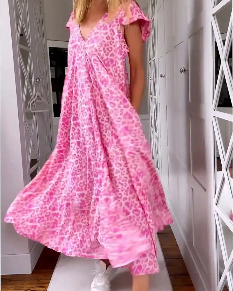 Casual short sleeve V-neck maxi dress for women, featuring a beautiful print; versatile summer style.