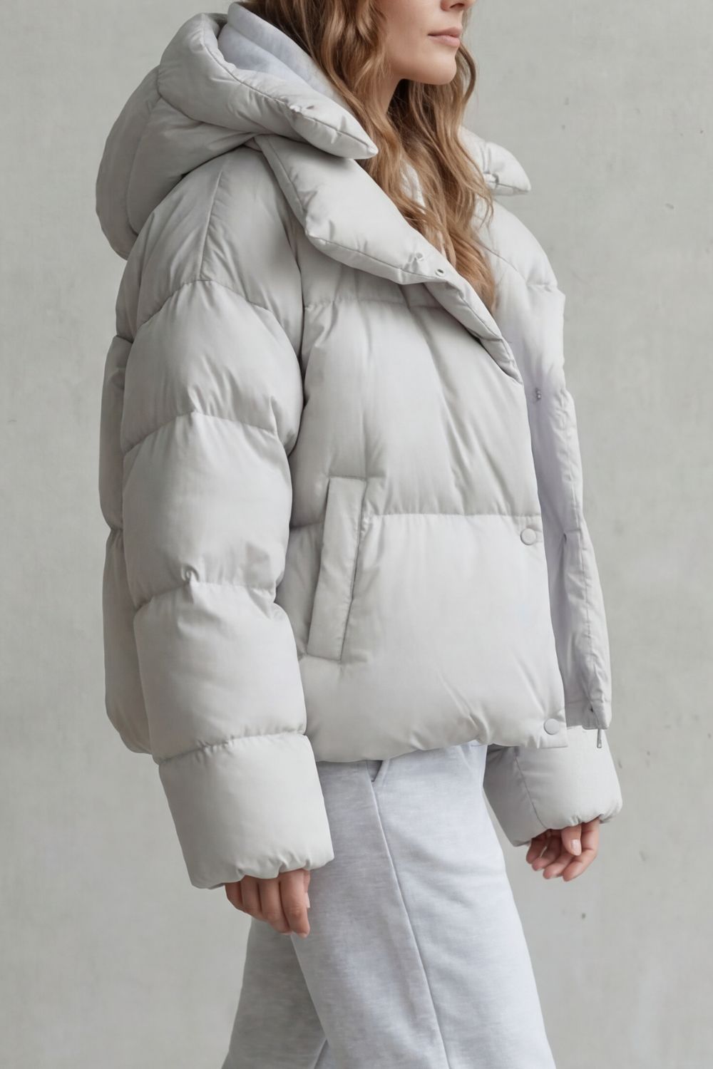 Warm women's cropped puffer jacket with cloud-soft feel, perfect for cozy winter outerwear.