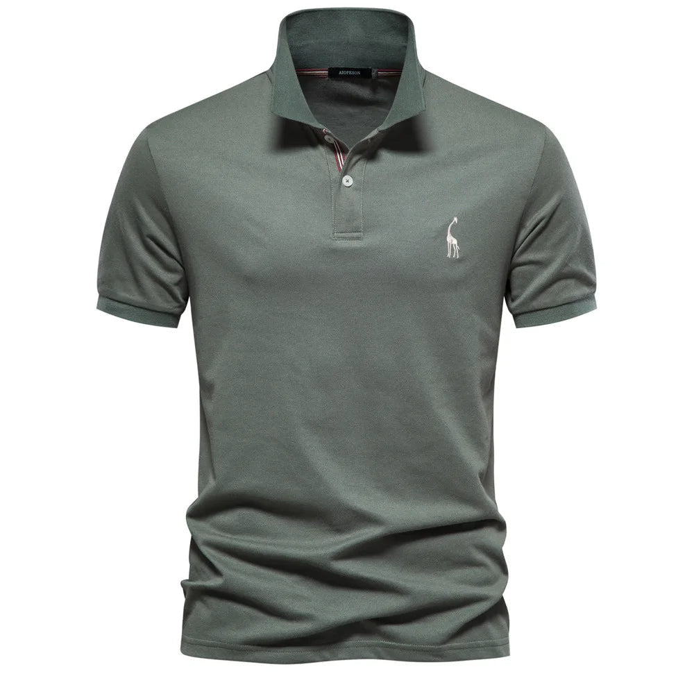 Men's luxe cotton polo shirt with elegant deer embroidery on the chest, a classic fit.