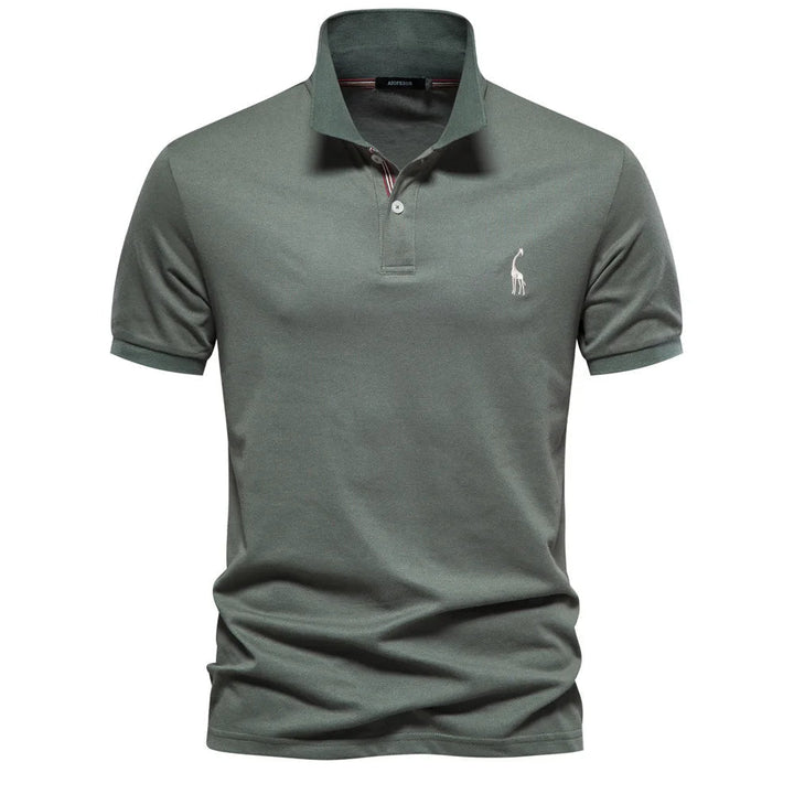 Men's luxe cotton polo shirt with elegant deer embroidery on the chest, a classic fit.