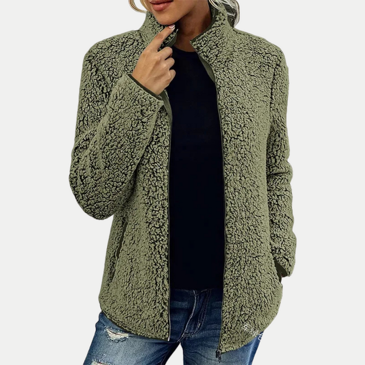 Cozy women's textured zip-up jacket, ideal for casual outings or everyday wear. Comfortable fleece outerwear with high collar.