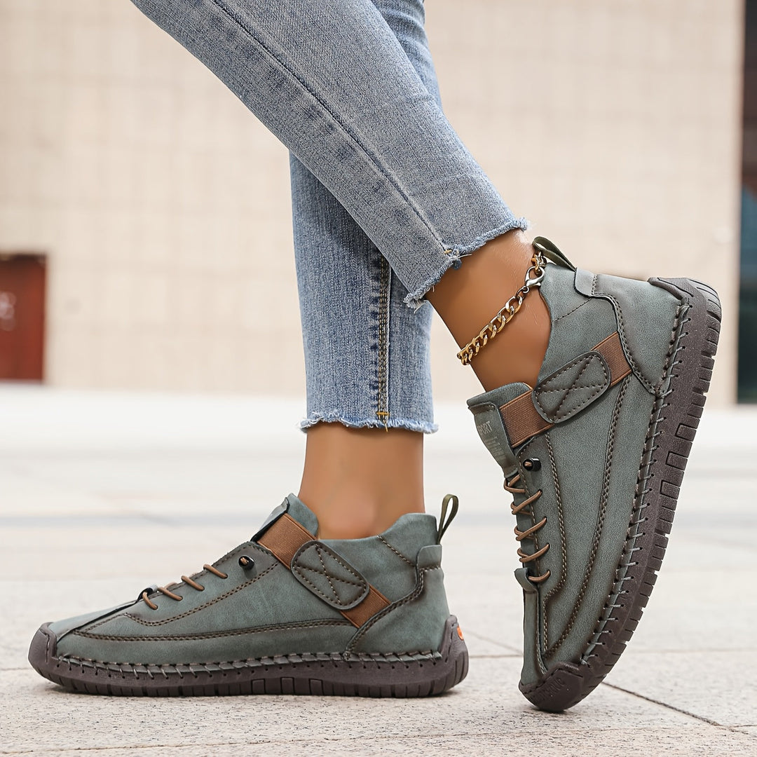 Women's orthopaedic comfort trainers for daily support, featuring a cushioned sole & adjustable strap.