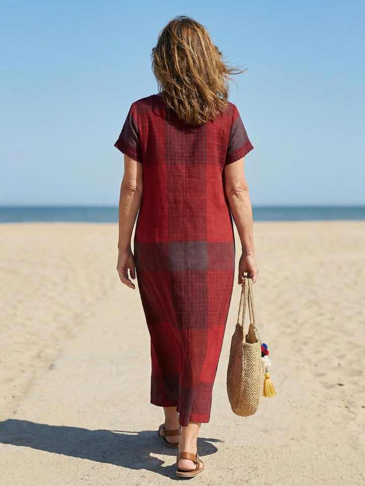 Relaxed fit women's midi dress in a classic burgundy plaid pattern, ideal for comfortable daily wear.