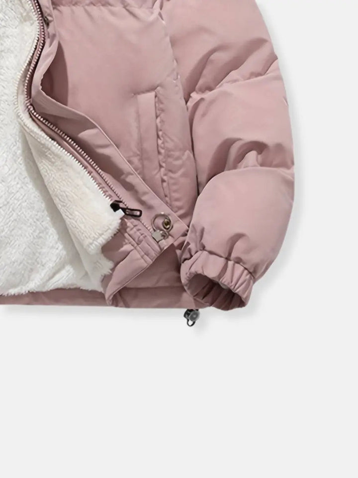 High-quality women's puffer jacket with a detachable plush hood, great for diverse winter styles.