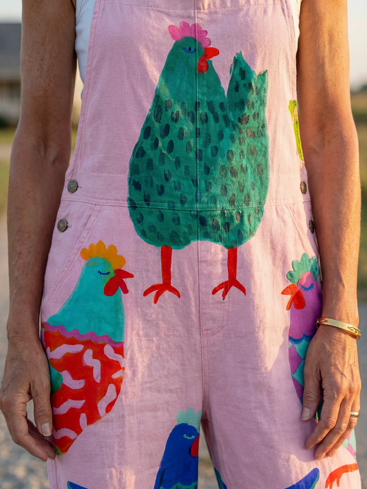 Relaxed fit pink women's jumpsuit with a cute hen motif print, a comfortable full-length option for summer and casual wear.