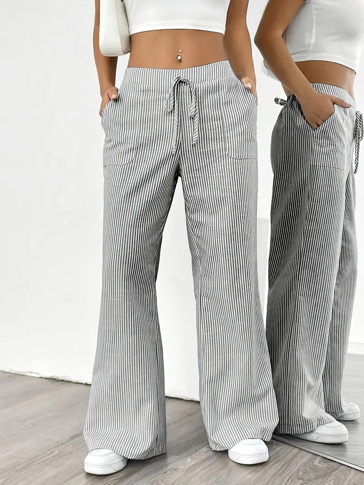 Summer-ready women's striped wide leg pants, airy fabric, convenient pockets.