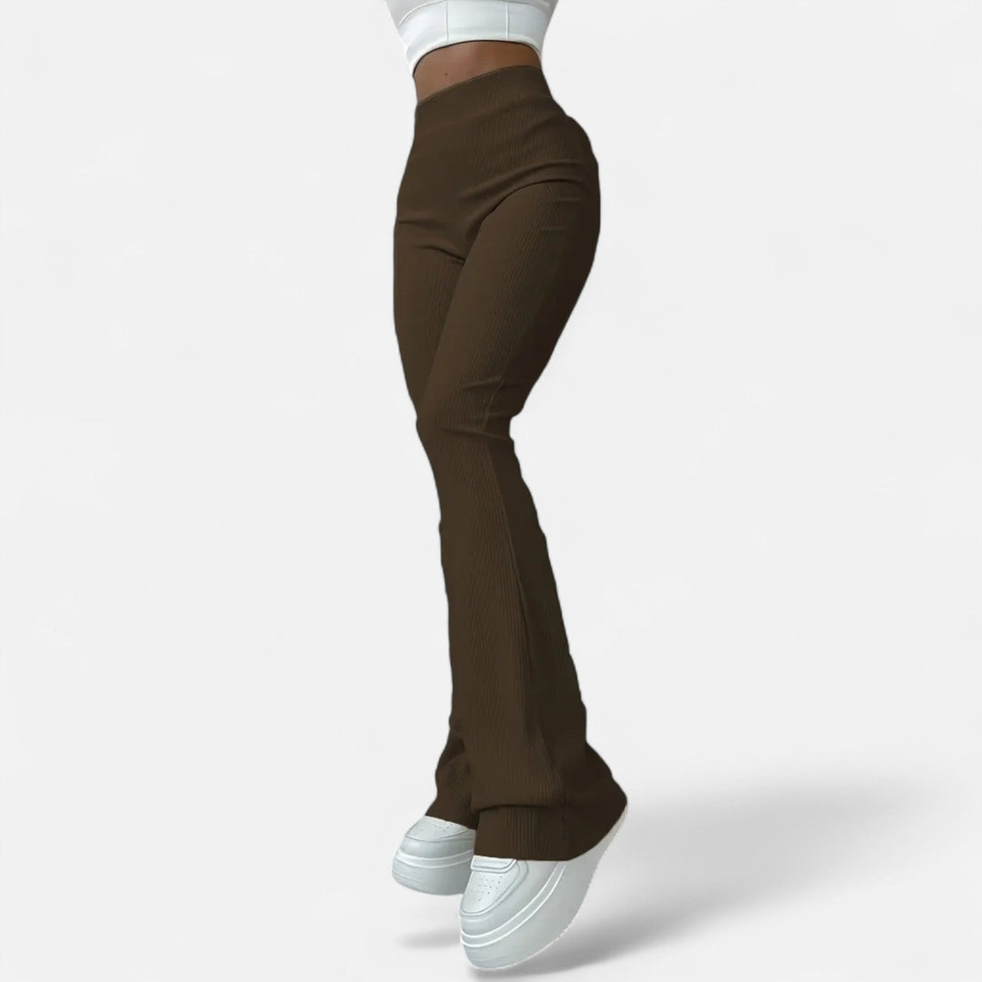 Elegant women's high-waist ribbed slim fit leggings, providing a modern and flattering look for any occasion.