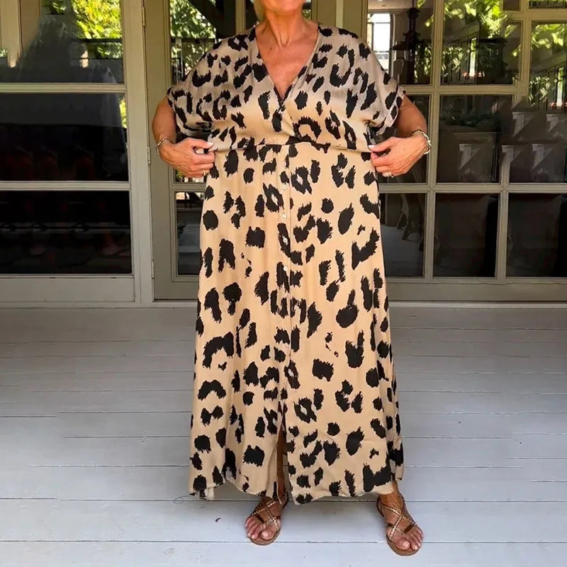 Elegant women's v-neck leopard print maxi dress. Flowy long dress, ideal for casual or summer events.