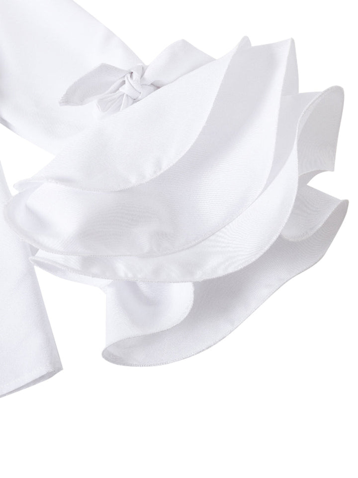 Feminine women's tiered ruffle blouse. Elegant button-up top with chic flare sleeves, great for any occasion.