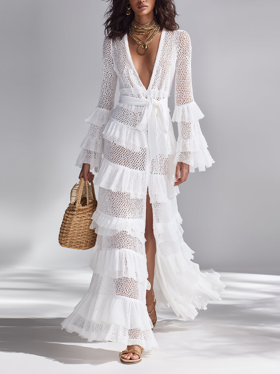 Stylish women's maxi length white crocheted cardigan, featuring elegant ruffles & long sleeves.