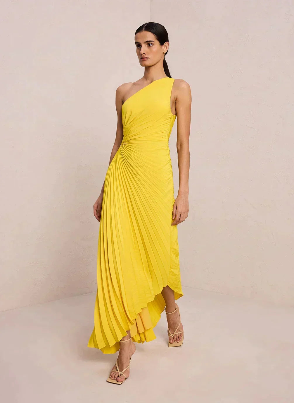 Women's formal one-shoulder midi dress, pleated for evening elegance.