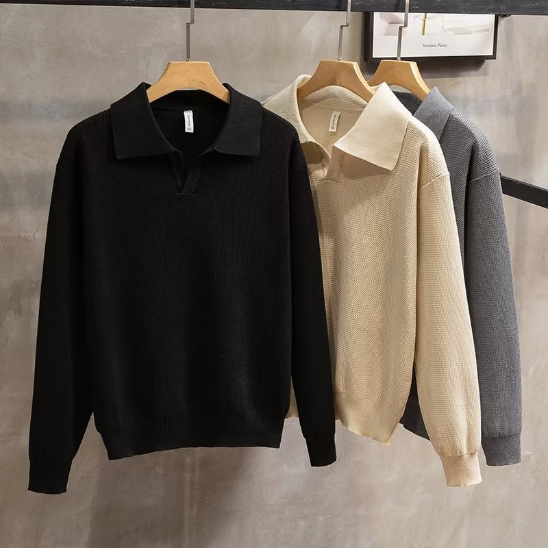 Detail shot of the collar and ribbed knit texture on a comfortable men's long sleeve polo sweater.