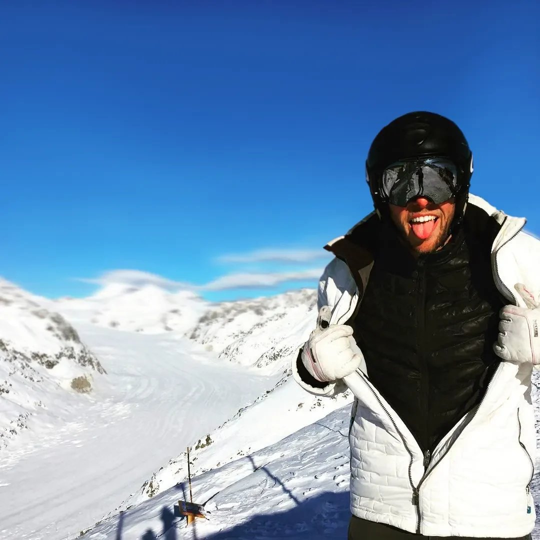 Durable, water-repellent thermal heated jacket, essential unisex clothing for outdoor adventures.