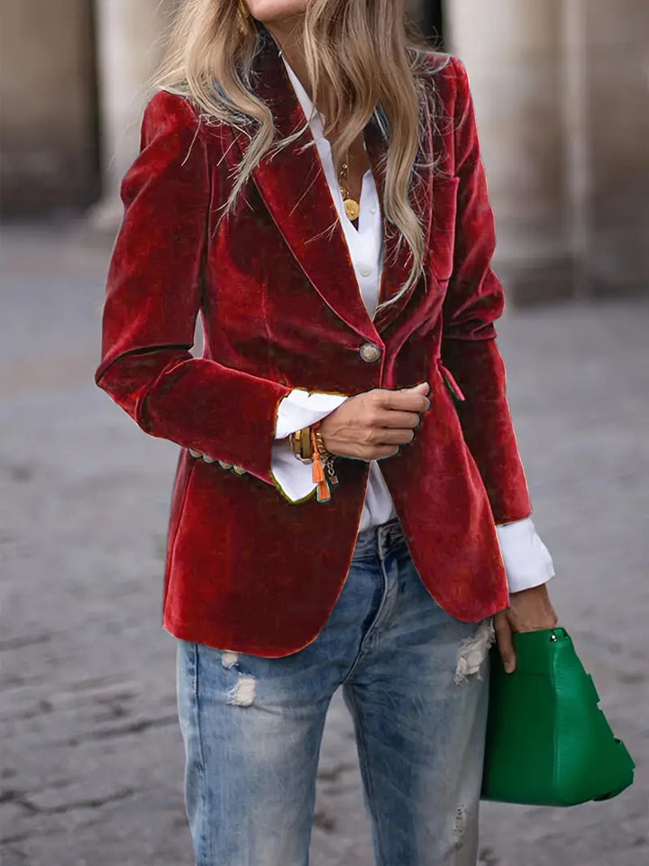 Formal single-button tailored jacket for women, suitable for professional and business occasions.