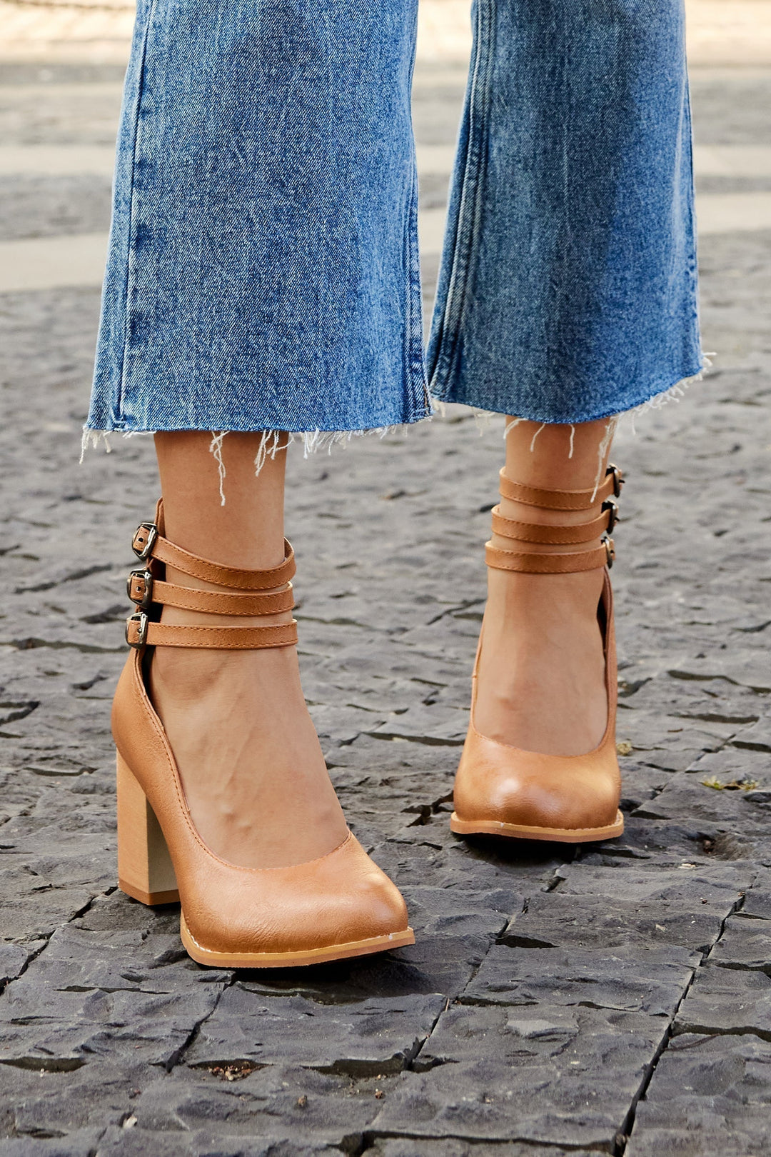 Classic women's elegant heels with a strong chunky block and secure ankle strap for stability.