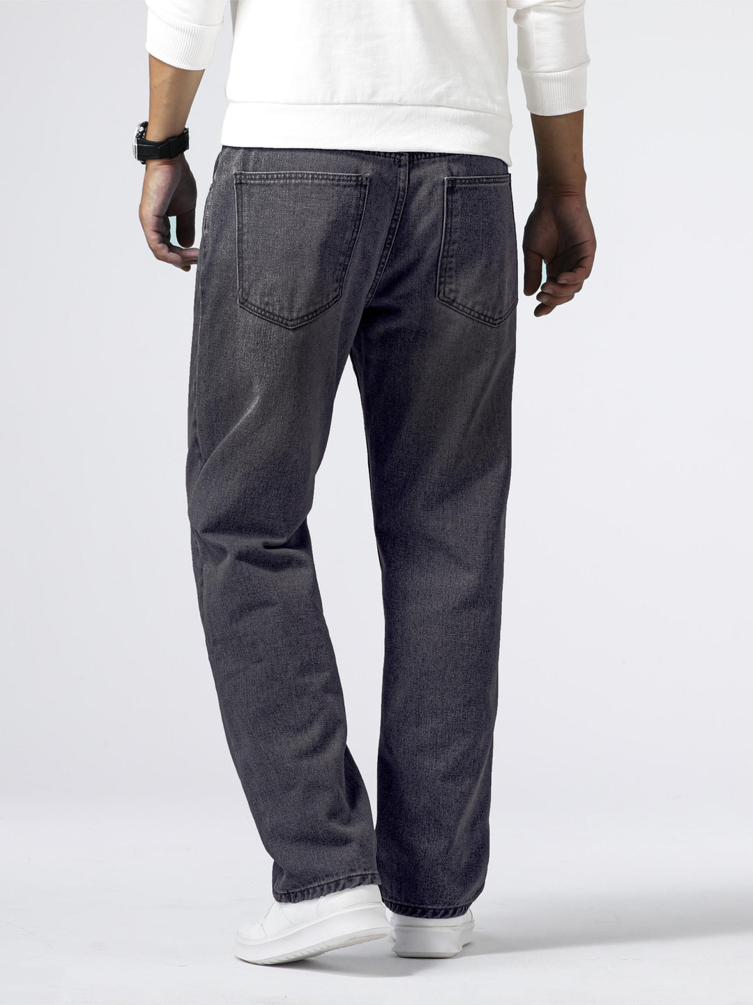 Detailed view of men's straight leg jeans in classic washed blue denim, comfortable and versatile fit.