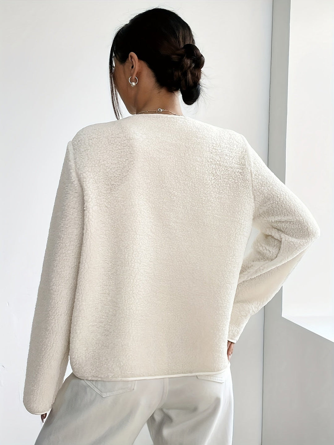 Full view of elegant women's button-front jacket. Long sleeve, comfortable & timeless for cool seasons.