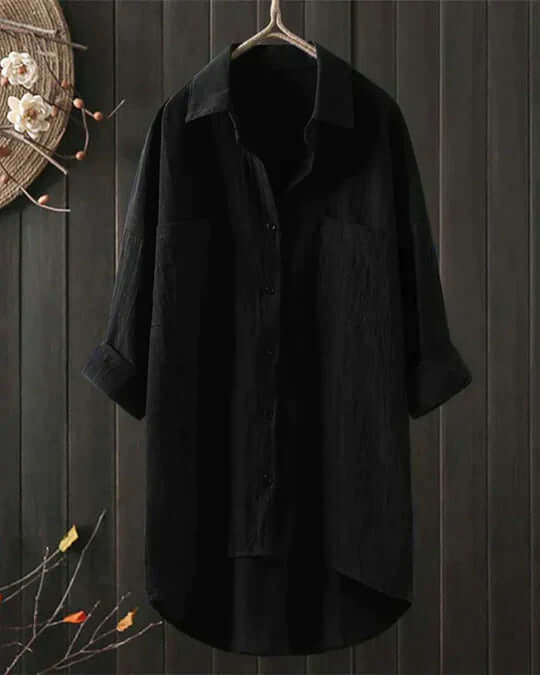 Versatile women's white flowy long-sleeve blouse. Comfortable loose fit, elegant casual wear, perfect for everyday style.