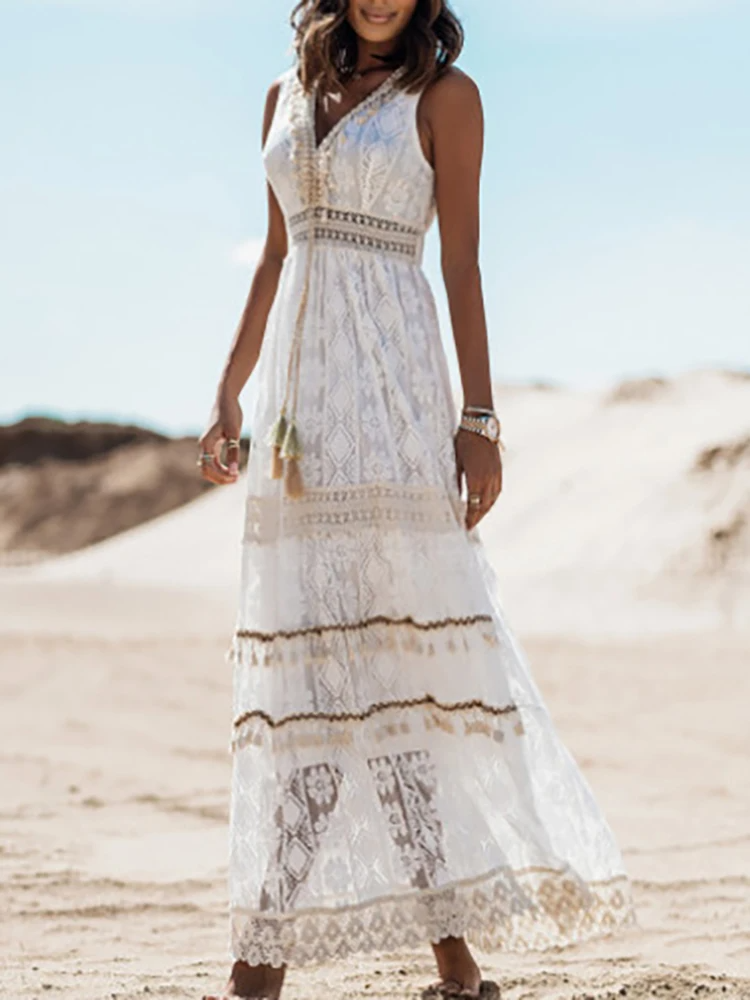 Chic women's vintage boho maxi dress. Comfortable drawstring design, combining casual ease with elegant summer fashion.