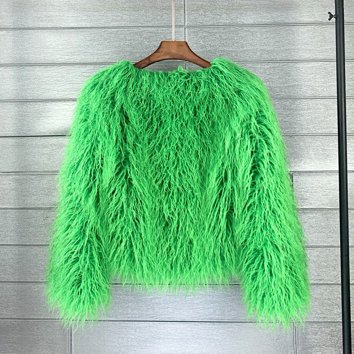 Fashionable women's elegant warm winter coat. Stylish long-sleeve autumn jacket & cozy winter outerwear.