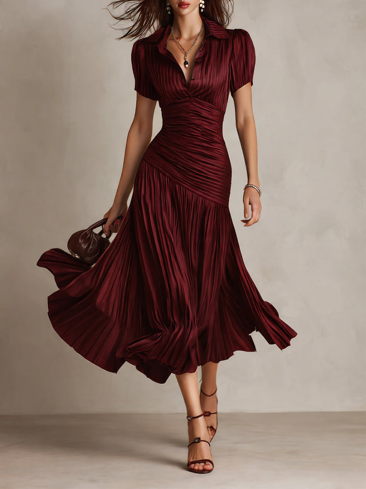 Pleated women's elegant striped midi dress with a retro touch, ideal for summer events.