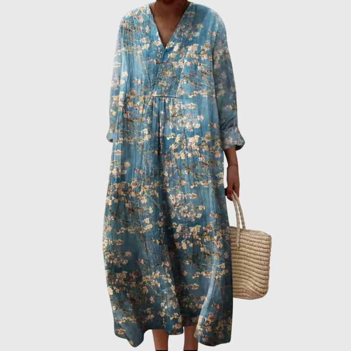 Chic women's geometric print maxi dress. Versatile & elegant, perfect for day to night wear with a modern fit.