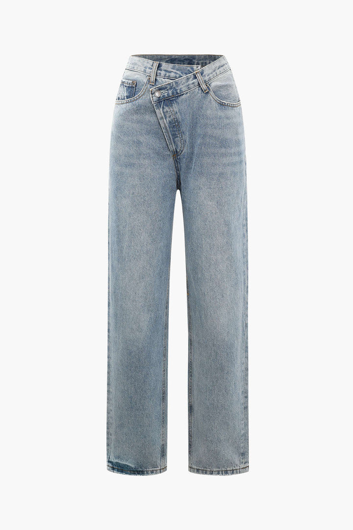 Women's asymmetric high-waisted straight-leg jeans in a light wash. Unique and trendy casual fashion.