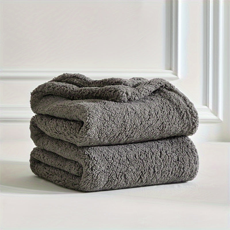 Reversible sherpa & fleece blanket, offering two incredibly soft textures for warmth & comfort in any room.