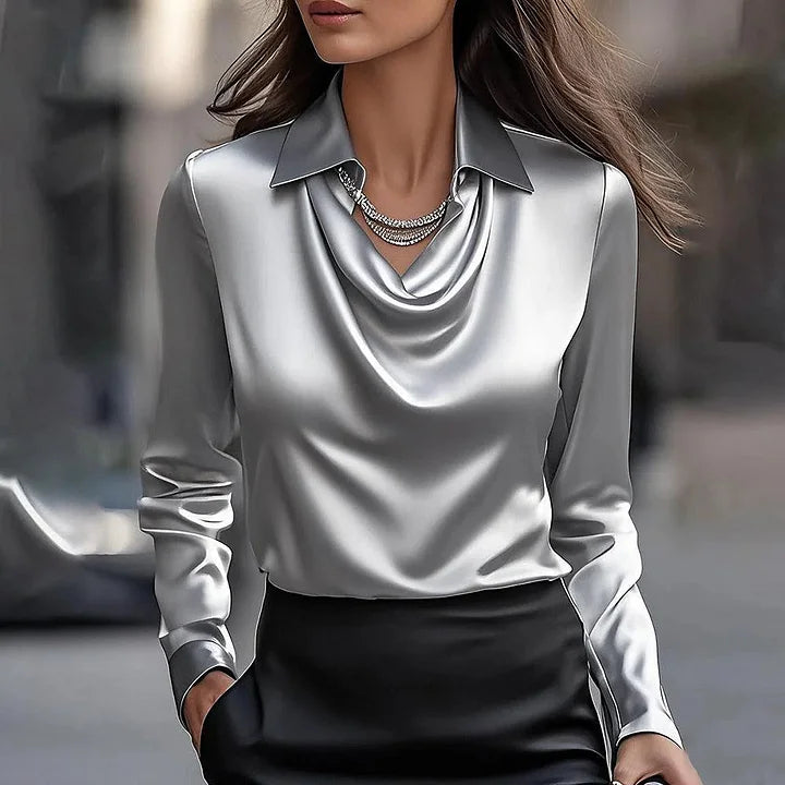 Sophisticated women's V-neck blouse in shiny lustrous fabric, great for elegant office attire & chic daily wear.