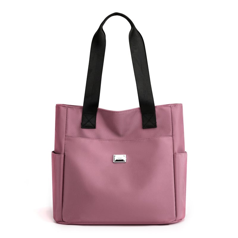 Waterproof & lightweight shoulder bag for women, secure storage for daily essentials & travel.
