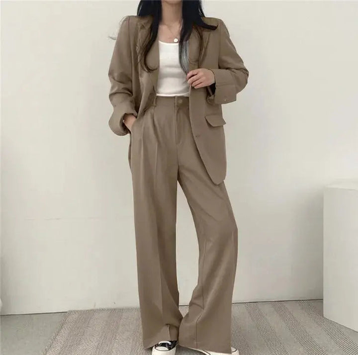 Women's smart casual blazer & trouser set, versatile for office or events.