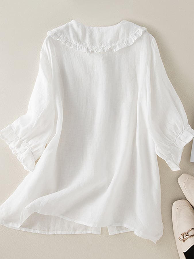 Casual blue women's loose fit shirt with a chic ruffled neck, offering a stylish and comfortable option for any day.