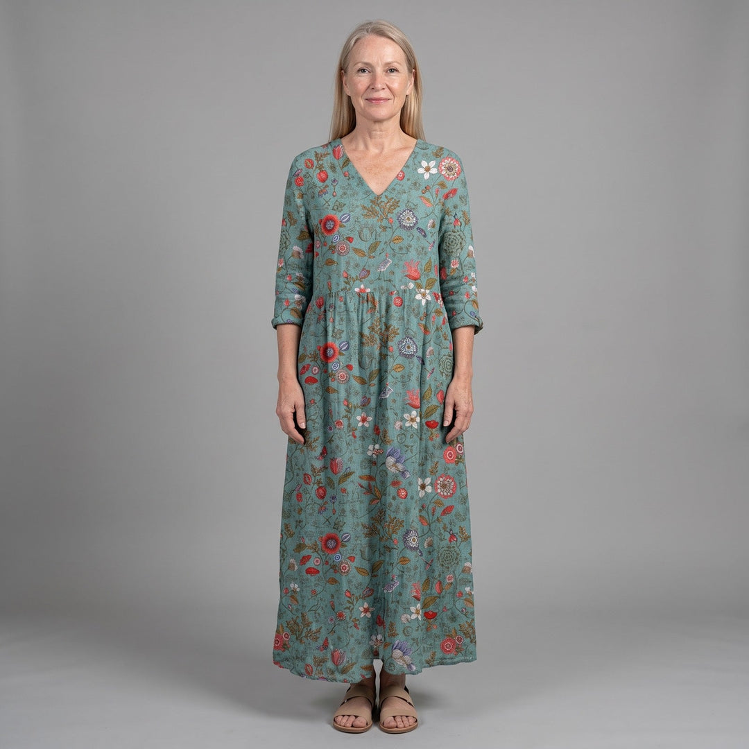 Women's effortless floral summer dress, a comfortable & elegant green flowy dress for versatile spring/summer casual & occasion wear.