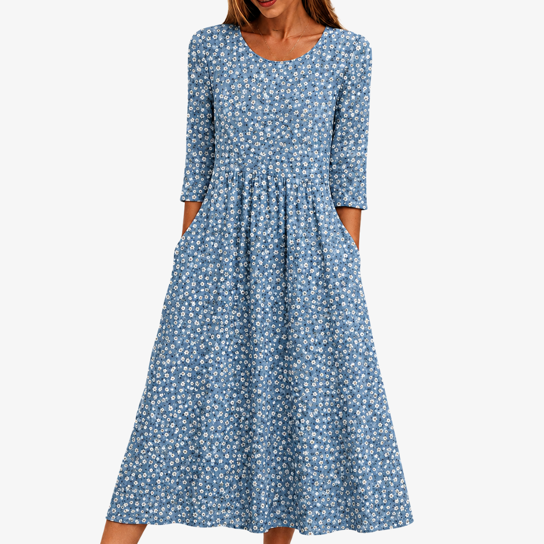 Women's Blue Daisy Floral Maxi Dress with Pockets, perfect for summer casual wear or elegant garden parties.