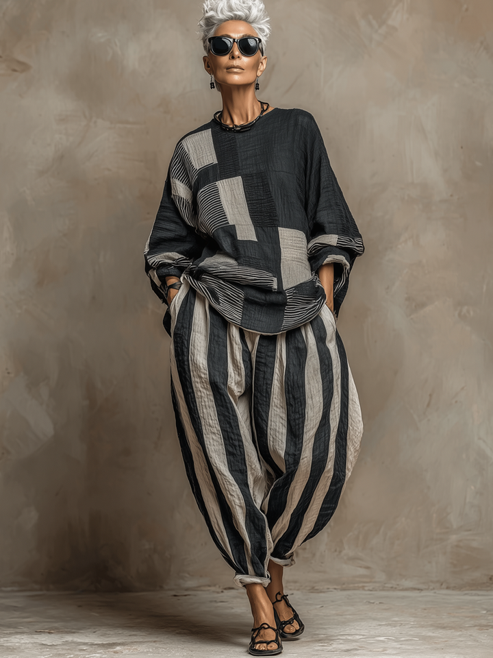 Fall fashion women's colour-block long sleeve top & striped wide-leg trouser two-piece set, perfect winter outfit.