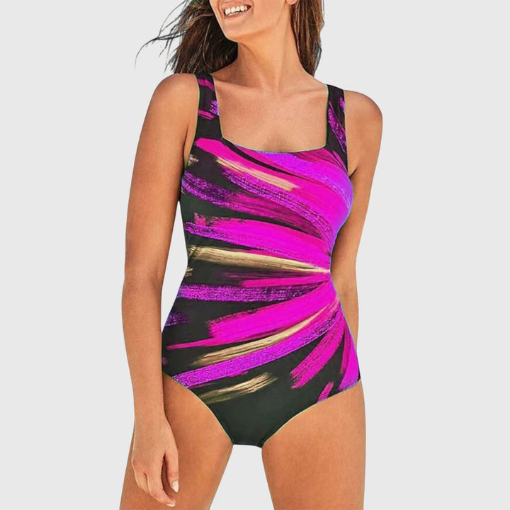 Women's shaping one-piece swimsuit with vibrant floral print, perfect for summer beachwear & pool.