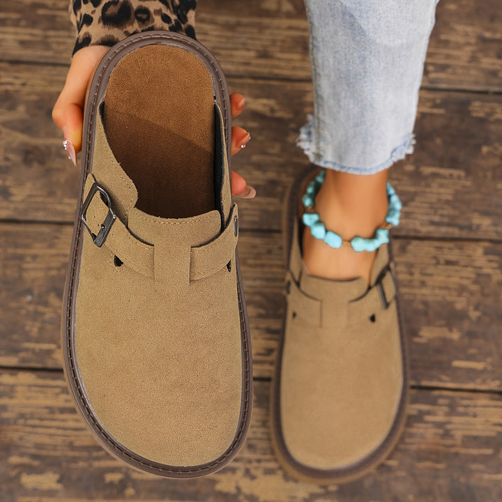 Trendy women's platform clogs, perfect for a casual yet elevated style.