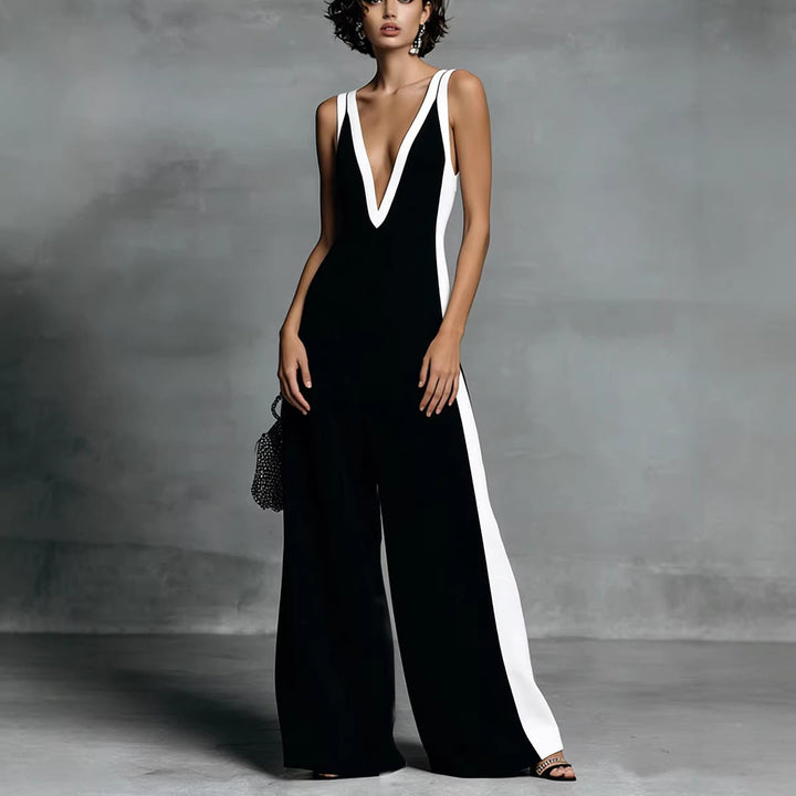 Stylish colour-block women's jumpsuit, a chic sleeveless V-neck wide leg one-piece perfect for evening wear.