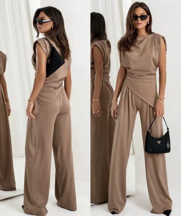 Chic women's draped top & wide-leg trousers set. Fashionable and comfortable matching outfit for any occasion.