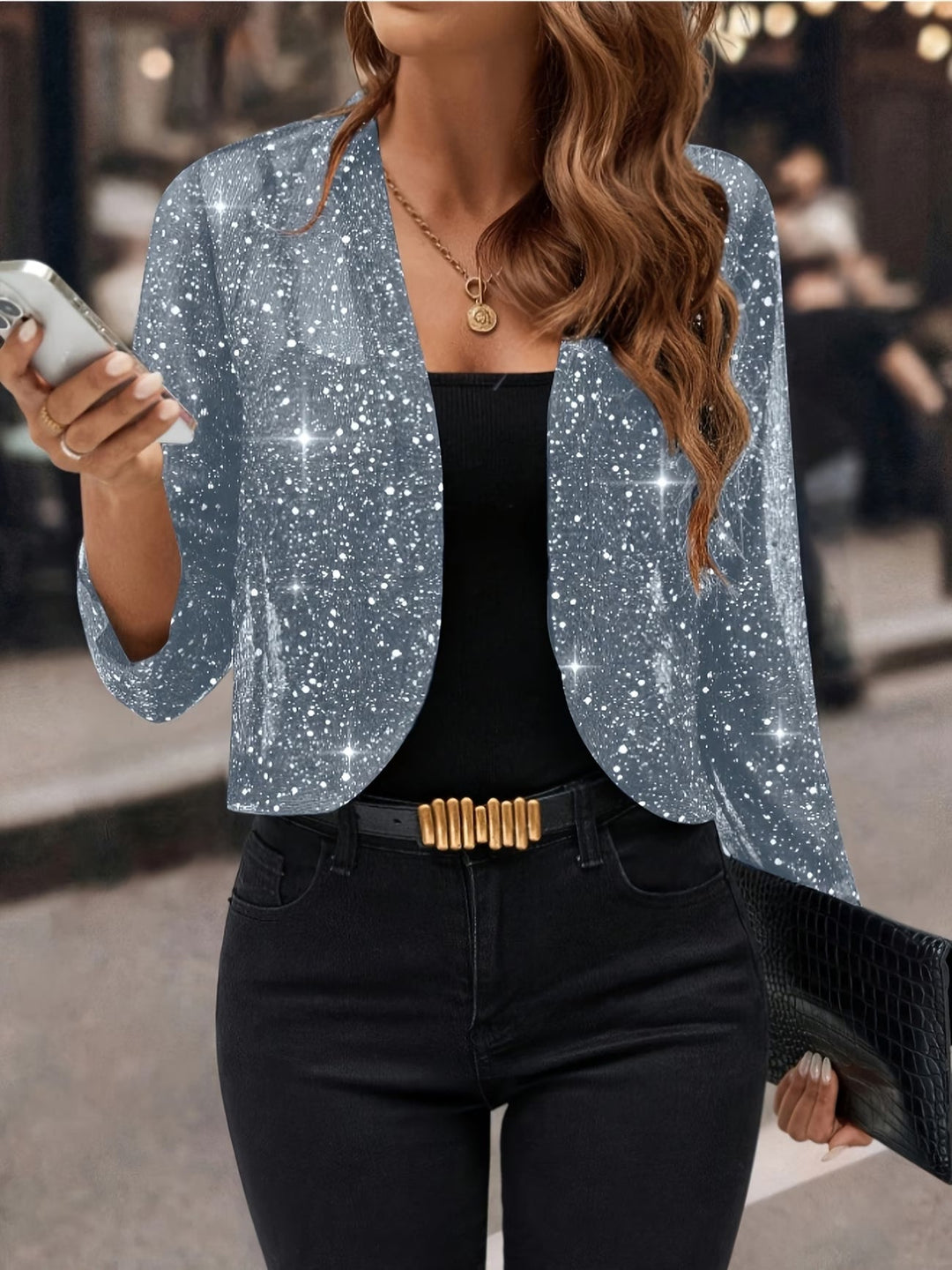 Women's glitter sequin cardigan, a fashionable and shimmering statement piece for special events.