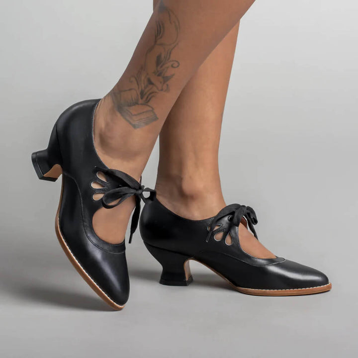 Women's vintage Mary Jane shoes with block heels, perfect for pin-up fashion & retro style.