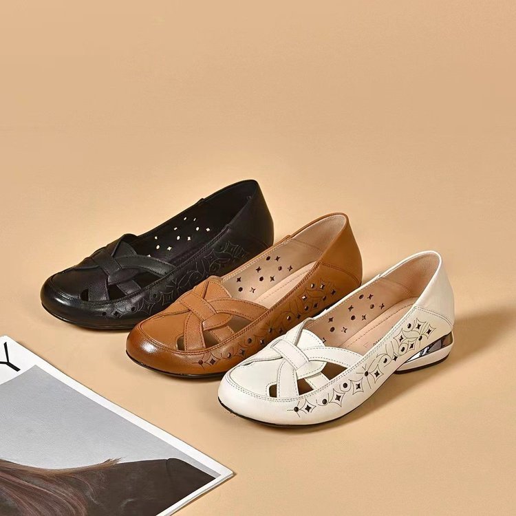 Casual women's perforated closed-toe slip-on shoes with ergonomic design for all-day comfort.