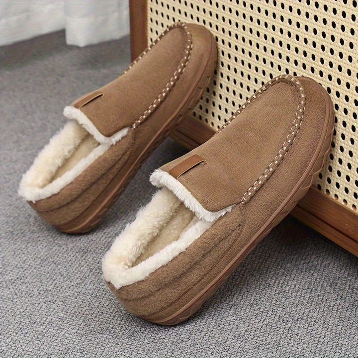 Warm men's indoor slippers with soft sheepskin lining, providing cozy comfort for loungewear.