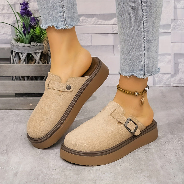 Versatile women's fashion clogs, closed-toe and easy to wear.