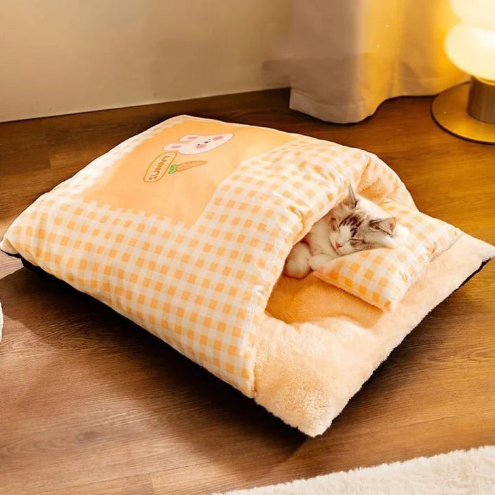 Washable plush cat sleeping bag bed. Provides a warm, cozy cave for feline comfort & naps.