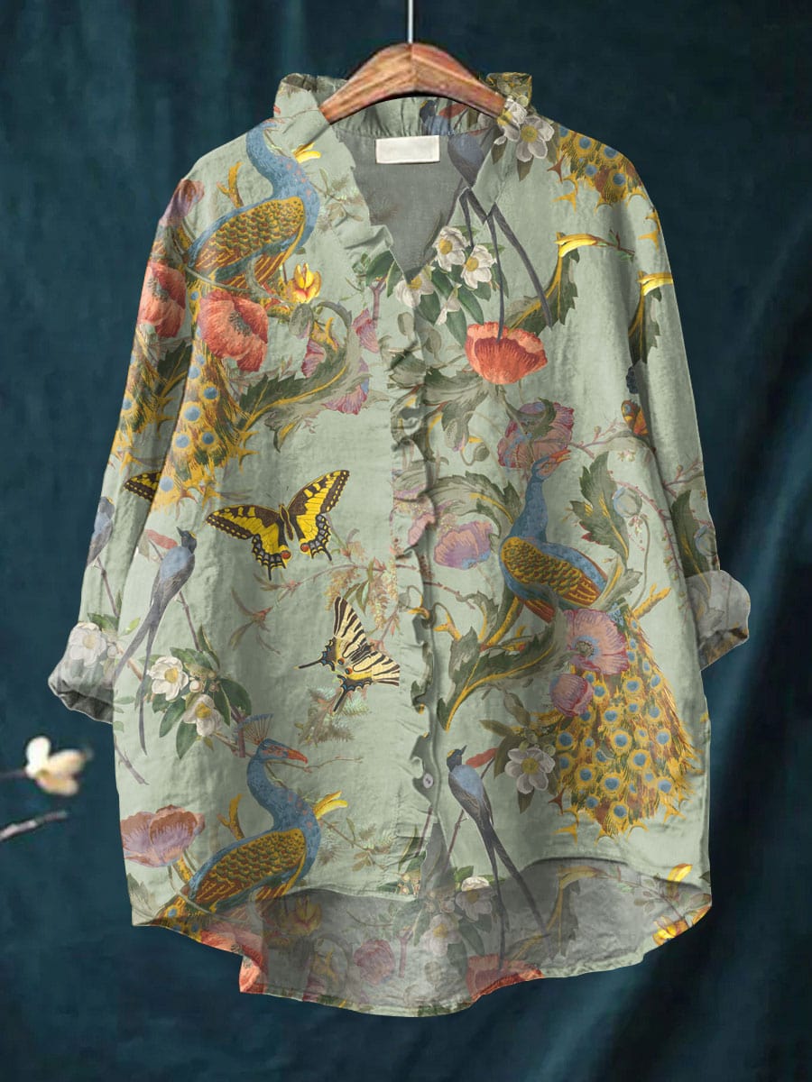 Elegant women's sage green long sleeve blouse with floral & bird print, ruffled details, and a high-low hem for a relaxed fit.