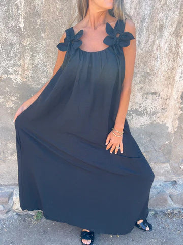 Lightweight women's vacation maxi dress with bow straps & U-neck, offering elegant flowing comfort & style.