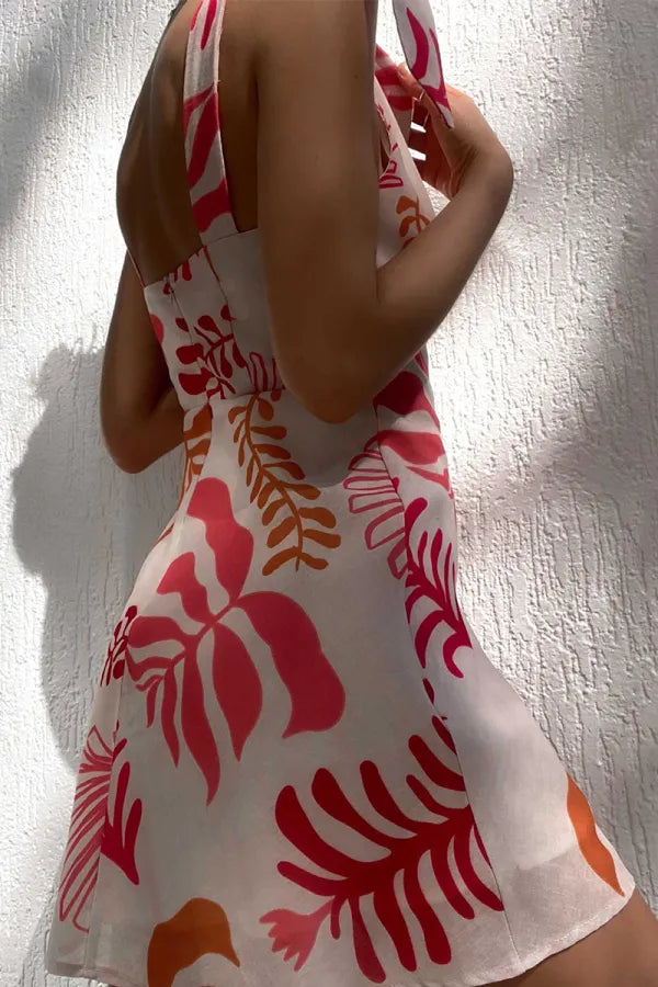 Vibrant red women's flattering mini dress, ideal for summer vacation & holiday parties. Sleeveless & chic.