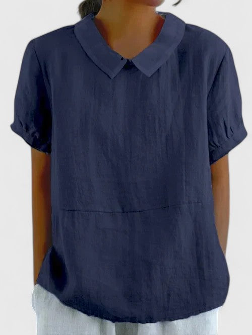 Timeless long-sleeve button-down women's shirt, sophisticated for ladies' office or casual fashion.