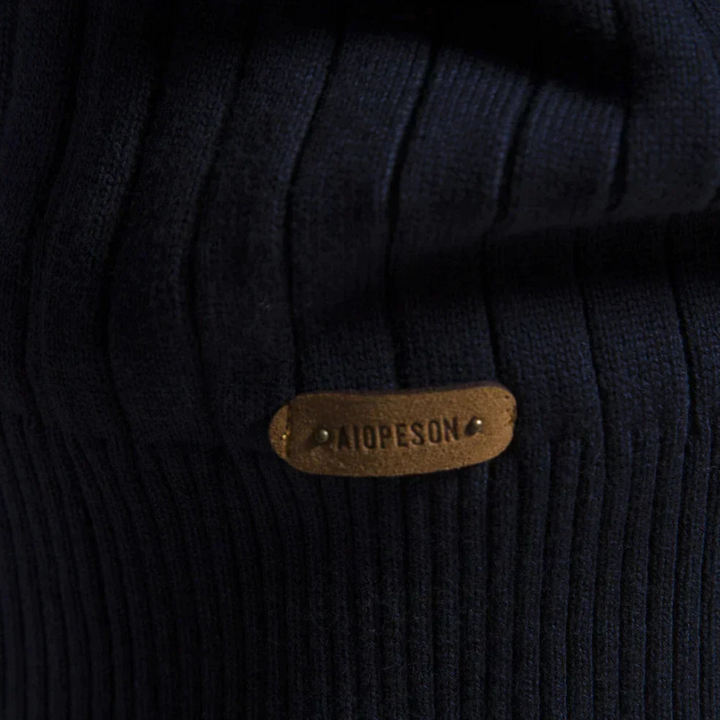 Classic men's long-sleeve quarter-zip sweater in a dark color, great for layering or casual everyday style.